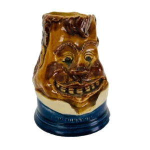 Fulham Pottery Character Jug Sunny Jim h20cm Circa 1900s A wonderful and interesting Fulham Pottery Character jug titled “I’m Sunny Jim Who are you?” Grotesque Martin Brothers, Wallace influence in design. Fully marked to the base as shown.